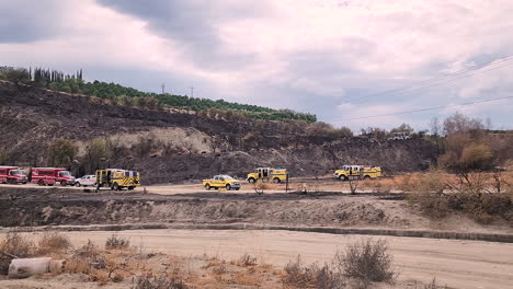 Firetrucks-and-Ambulances-at-mountain-during-fire