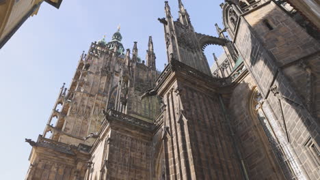 Prague,-Czech-Republic---Tourists-walking-past-Pražský-hrad-Castle-spires