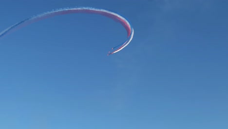 Split-S-and-Barrel-Roll-Performed-by-the-Red-Arrows-with-Kuwait-Towers-in-the-Background