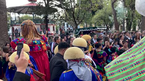 slow-motion-shot-of-a-newlyweds-traditional-dance-in-chiapas-mexico-wearing-the-traditional-costumes-and-hats