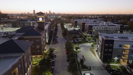 Aerial-view-over-the-Leona-street-in-middle-of-luxury-apartments-in-Houston,-dusk-in-USA