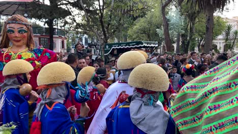 slow-motion-shot-of-a-newlyweds-traditional-dance-in-san-cristobal-de-las-casas,-chiapas,-mexico-wearing-traditional-costumes-and-hats