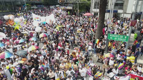 High-angle:-Festive-Gay-Pride-Day-people,-fun-on-Mexico-City-street