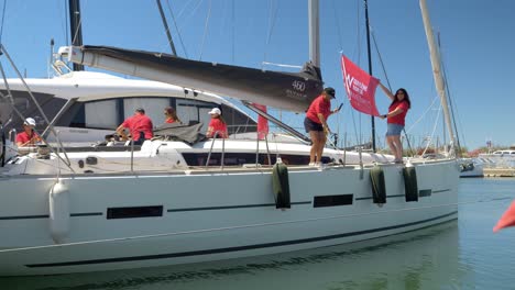 Slowmotion-shot-of-a-crew-getting-ready-at-the-port-of-Le-Grau-du-Roi