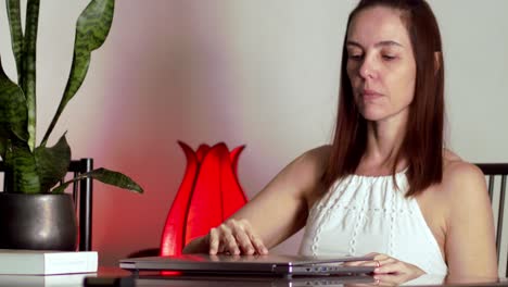 caucasian-middle-aged-woman-working-from-home-with-laptop