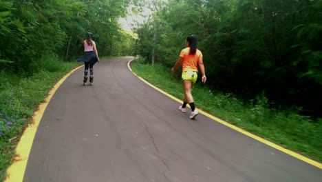 Girl-Walking-On-Rural-Street-While-Another-Girl-Passing-On-Rollers,-Asunction