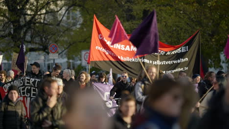 Protesters-on-Berlin-street-with-banners-against-rise-of-life-costs-in-Germany