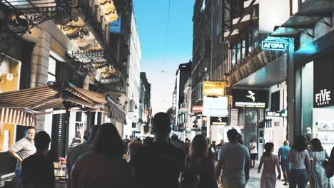 Ermou-Street-packed-with-people-shopping-on-a-Summer-evening