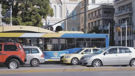 Traffic-moving-slowly-along-Peiraios-Street-on-a-hot-Summers-day