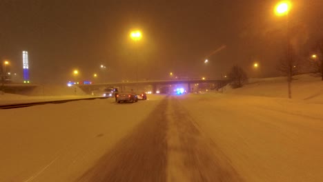 POV-shot-traveling-past-drivers-broken-down-and-through-emergency-services-attending-a-crash