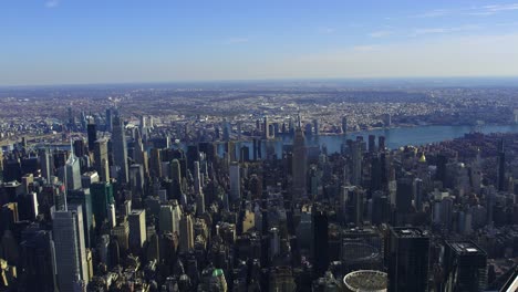 Aerial-overview-of-the-Midtown,-Manhattan-metropolis,-sunny-New-York-city,-USA