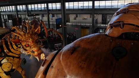 The-Dragon-battling-the-Minotaure-at-"La-Halle-de-la-Machine",-in-Toulouse,-France