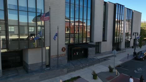 People-cross-street-at-City-of-Easton-Pennsylvania-government-office-building