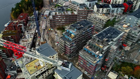 Construction-site-with-crane-in-Stockholm-urban-area,-Sweden