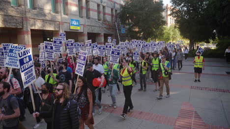 Diverse-Crowd-of-UC-Academic-Workers-on-Strike-on-UCLA's-Campus-with-Signs-and-Leaders-with-Megaphones