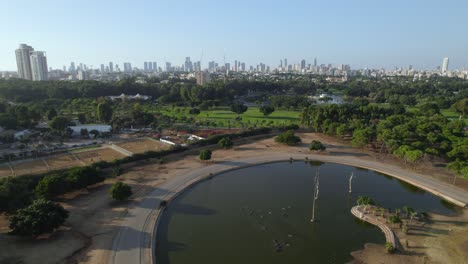 Static-shot-over-the-hippos-lake-of-the-Ramat-Gan-Safari,-Israel---drone-shot-#004