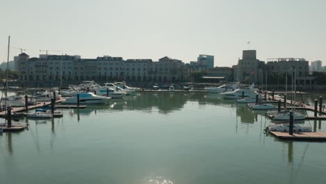 Luxurious-yachts-in-Guangzhou-Nansha-Port-marina,-China-in-aerial-view