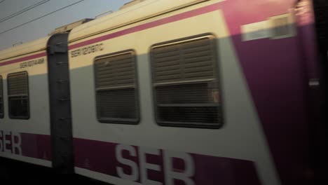 Local-train-running-with-empty-coached-and-less-crowd,-Kolkata,-West-Bengal