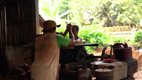 The-process-of-preparing-clay-dough-for-making-pottery-using-a-grinding-machine