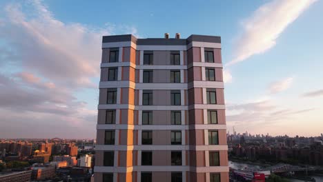 Aerial-view-in-front-of-the-Grand-Concourse-building,-sunset-in-The-Bronx,-NY