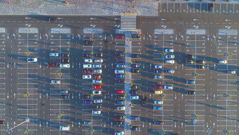 Automobile-Parking-Lot,-Outdoor-Car-Park-Or-Crowded-Supermarket-Parking-Lot-In-Suburban-Usa,-Aerial-View-From-The-Drone