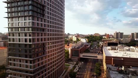 Aerial-view-of-the-Hostos-Center-for-the-Arts-and-Culture-and-the-425-Grand-Concourse-building,-sunny-evening-in-Bronx,-NY