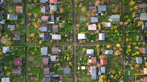 Calm-aerial-view-flight-vertical-bird's-eye-view-drone
berlin-teufelsberg-Allotment-gardens-evening-sunset-2022