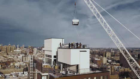 Blue-collar-migrant-workers-on-duty-at-broadway-NewYork-aerial