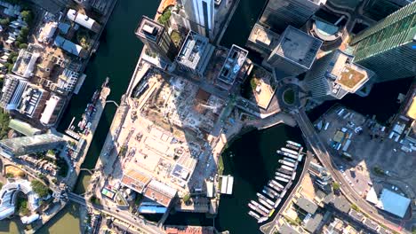 Vertical-aerial-view-of-the-Isle-of-Dogs-towers,-London,-UK