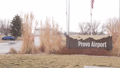 Sign-on-Sky-Way-road-for-the-old-Provo,-Utah-Airport-with-snow,-sleet-and-rain