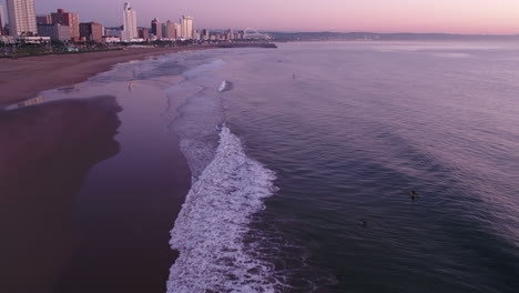 Early-morning-drone-along-Durban-coastline-to-reveal-the-city-centre-and-Moses-mabhida-stadium