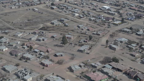 Wide-aerial-drone-shot-of-a-rural-township-in-South-Africa