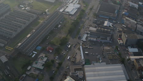 Wide-drone-shot-over-an-industrial-area-of-Durban,-South-Africa-with-warehousing-and-factories