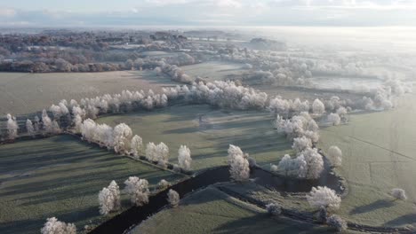 Aerial-footage-of-a-hoar-frost-over-Dedham-Vale,-Essex-in-the-early-morning