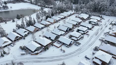Drone-shot-of-a-retirement-community-covered-in-snow