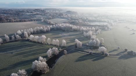 Further-aerial-footage-of-a-hoar-frost-over-Dedham-Vale-moving-towards-Dedham-church-and-village-in-the-distance