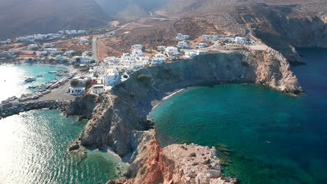 Aerial-idyllic-views-Folegandros-Island-Natural-beaches-Surrounded-by-cliffs-and-Turquoise-water