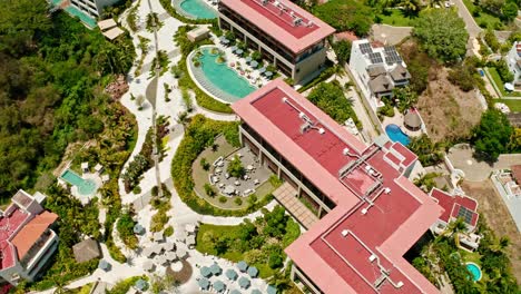Aerial-flying-over-Puerto-Vallarta-Resort-in-Mexico-at-day,-panning-shot