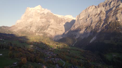 aerial-drone-footage-pushing-in-over-village-of-Grindelwald-towards-Mount-Wetterhorn