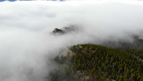 Misty-Low-Fog-And-Clouds-Over-Rocky-Mountain-Alpine-Woodland-Hill-Peaks