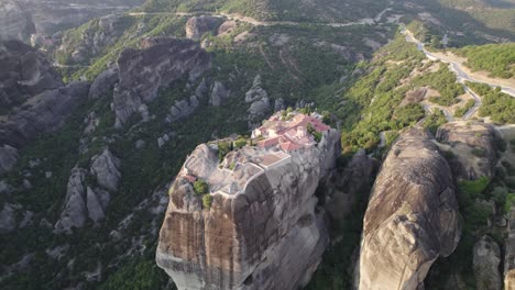 Unreal-aerial-view-of-Monastery-of-the-Holy-Trinity,-incredible-church-architecture-on-top-of-the-cliff