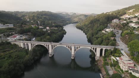Aerial-forward-view-of-an-amazing-Douro-valley-with-its-bridge