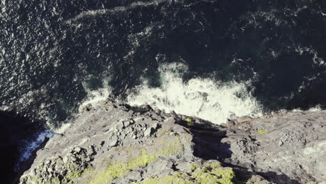 Slow-motion-bird's-eye-view-of-famous-cliffs-of-moher,-Ireland-on-sunny-day