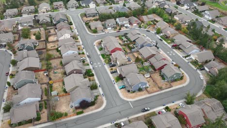 Aerial-of-a-neighborhood-community-during-the-summer-with-burnt-lawns