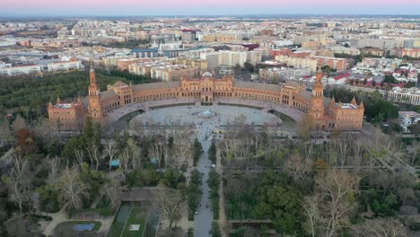 Spain-square-or-Plaza-de-España-in-Seville,-pull-back-aerial-shot,-tourism-site
