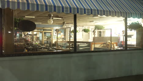 Exterior-shot-looking-through-windows-to-retro-style-diner-restaurant
