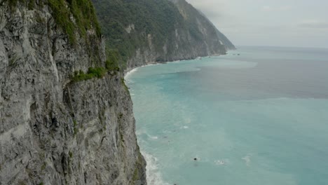 Qingshui-cliffs-close-aerial-across-rocky-mountain-formation-of-Taroko-gorge-Hualien-County