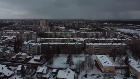 Private-homes-near-massive-block-apartment-buildings-in-Kaunas,-aerial-view
