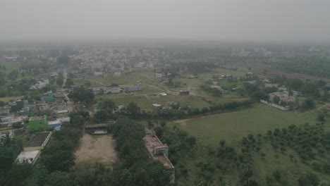Slow-Zoom-Out-Aerial-Shot-of-Remote-Location-on-Top-of-the-Hills-|-4K-|-Rural-Town