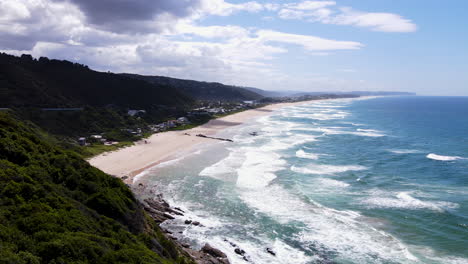 Drone-view-of-gorgeous-stretch-of-white-sand-beach---Wilderness,-South-Africa